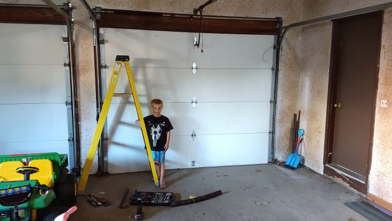 Working On A Bit of DIY Garage Door Repair