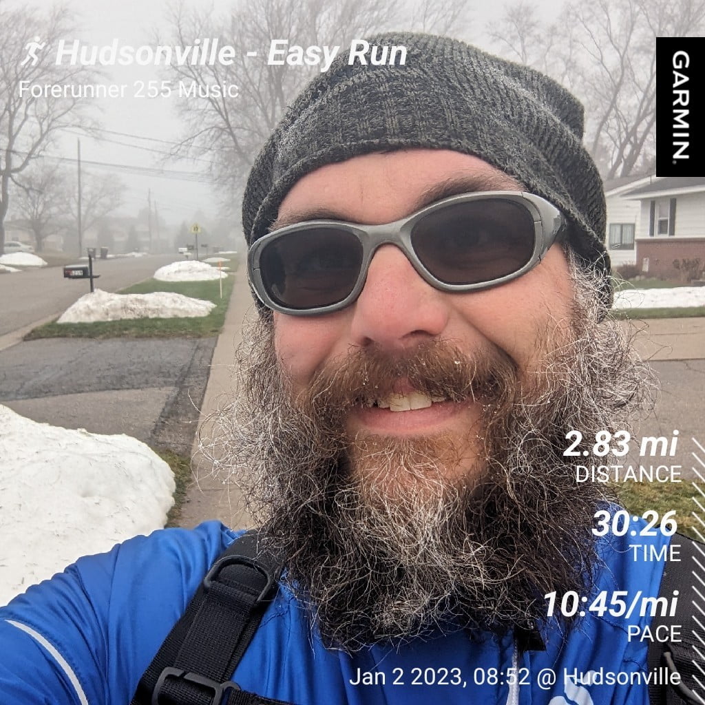 Hudsonville - Easy Run | Distance: 2.83 miles, Time: 30:26, Pace: 10:45 min/mile / Morning neighborhood street selfie with snow and fog in the background.