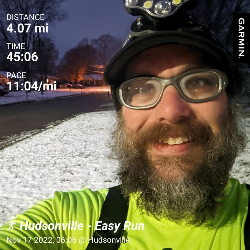 Distance: 4.06 miles, Time: 45:06, Pace: 11:04 min/mile | Me during my cool down after my early morning snowy run.
